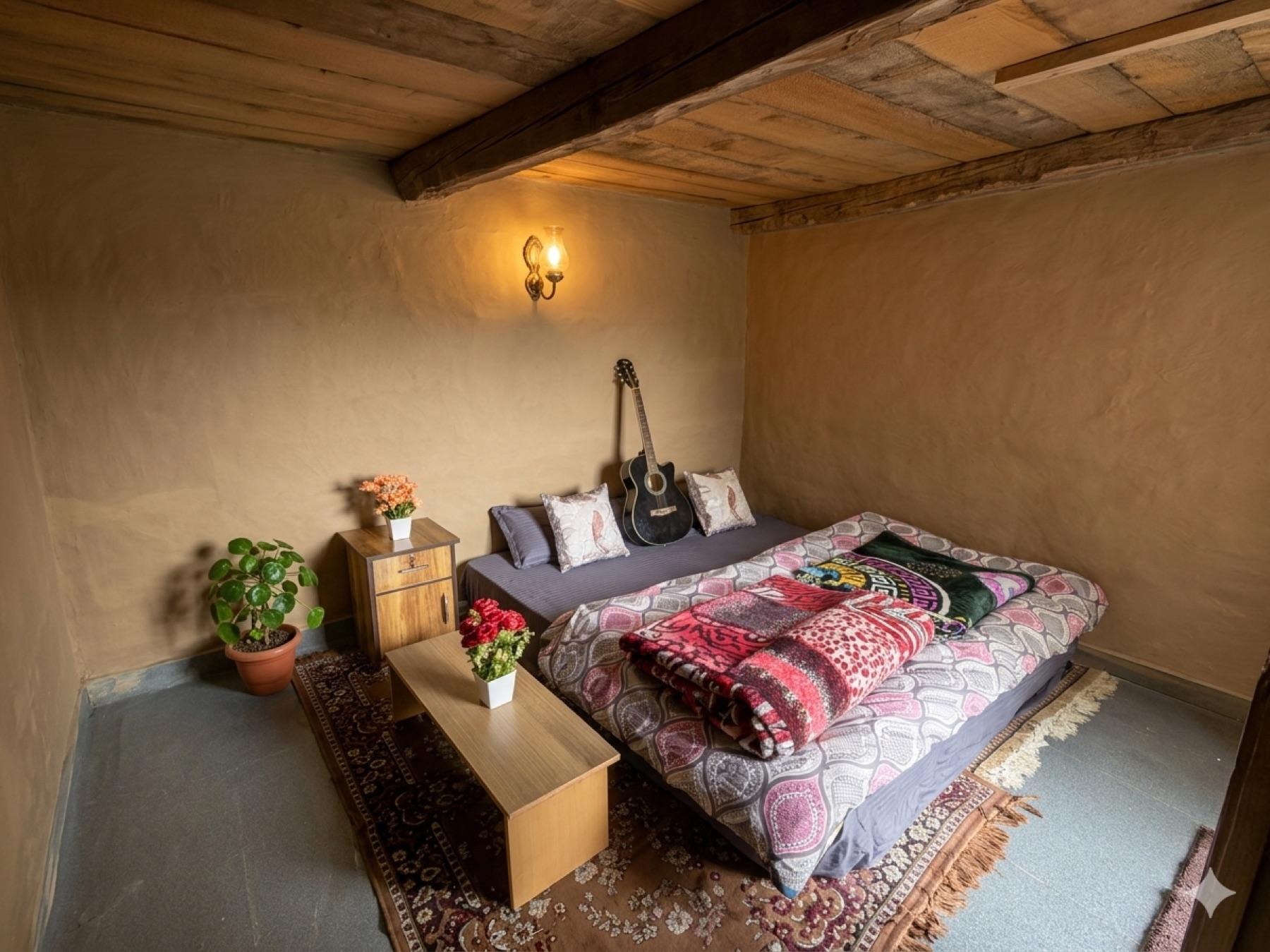 The attic café — ground cushions, low tables, apple trees outside